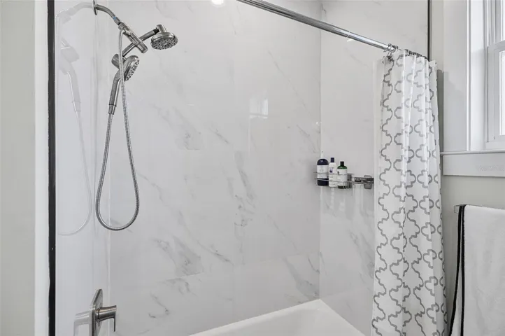 FULL TILE SHOWER IN HALL BATHROOM