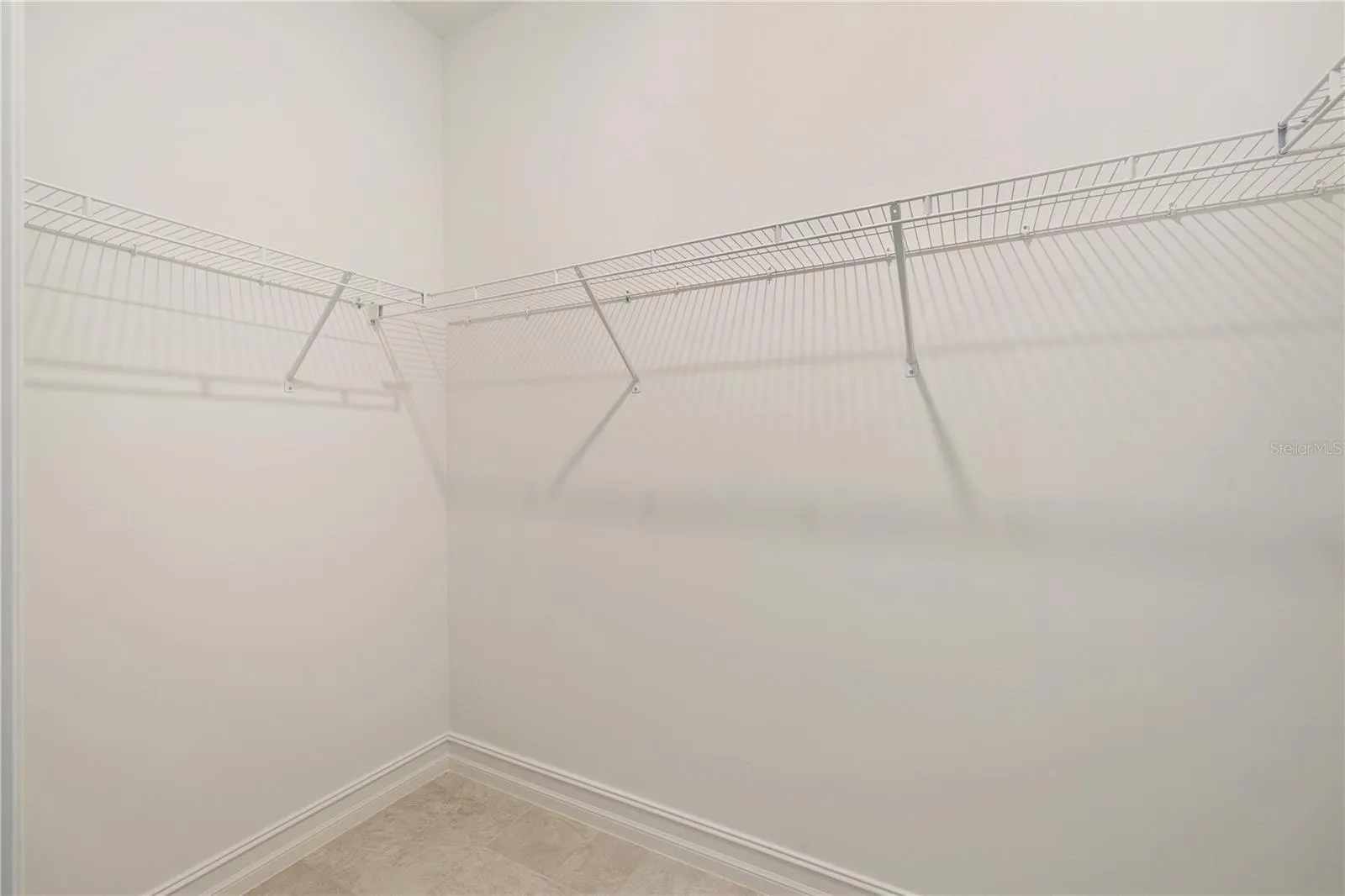Two walk-in closets in Primary Bedroom
