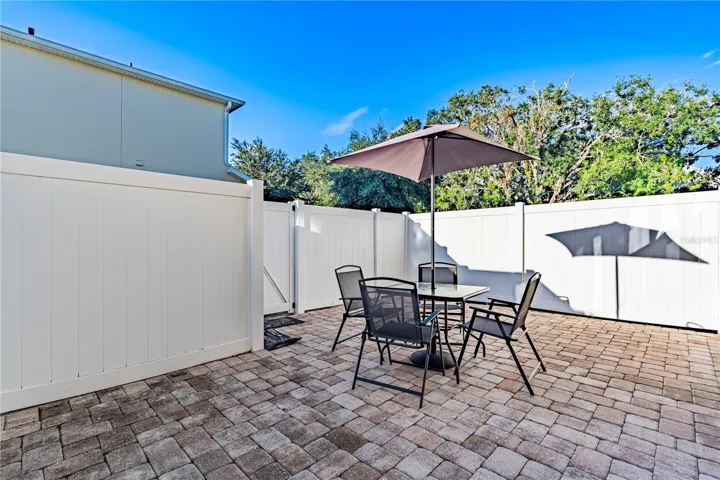 This extra spacious fenced area is ideal for a jacuzzi, grill and table.