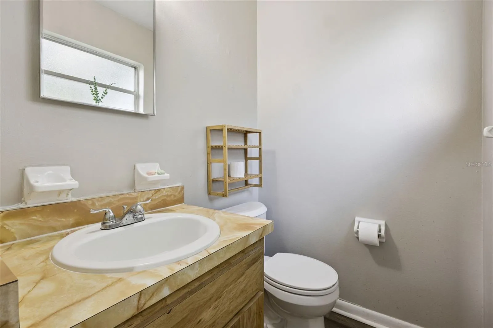 Primary Suite has 1/2 Bath.