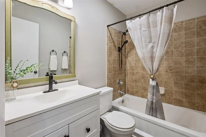 Full Bathroom with newer vanity.