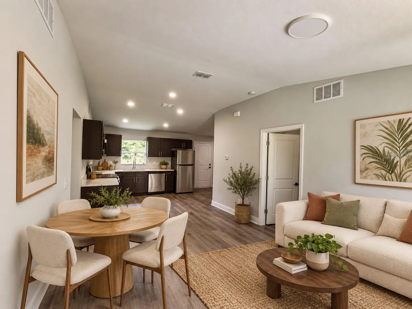 Living and dining area - virtually staged