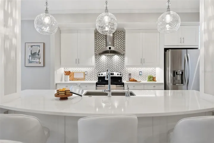 Timeless quartz countertops; updated "one level" island