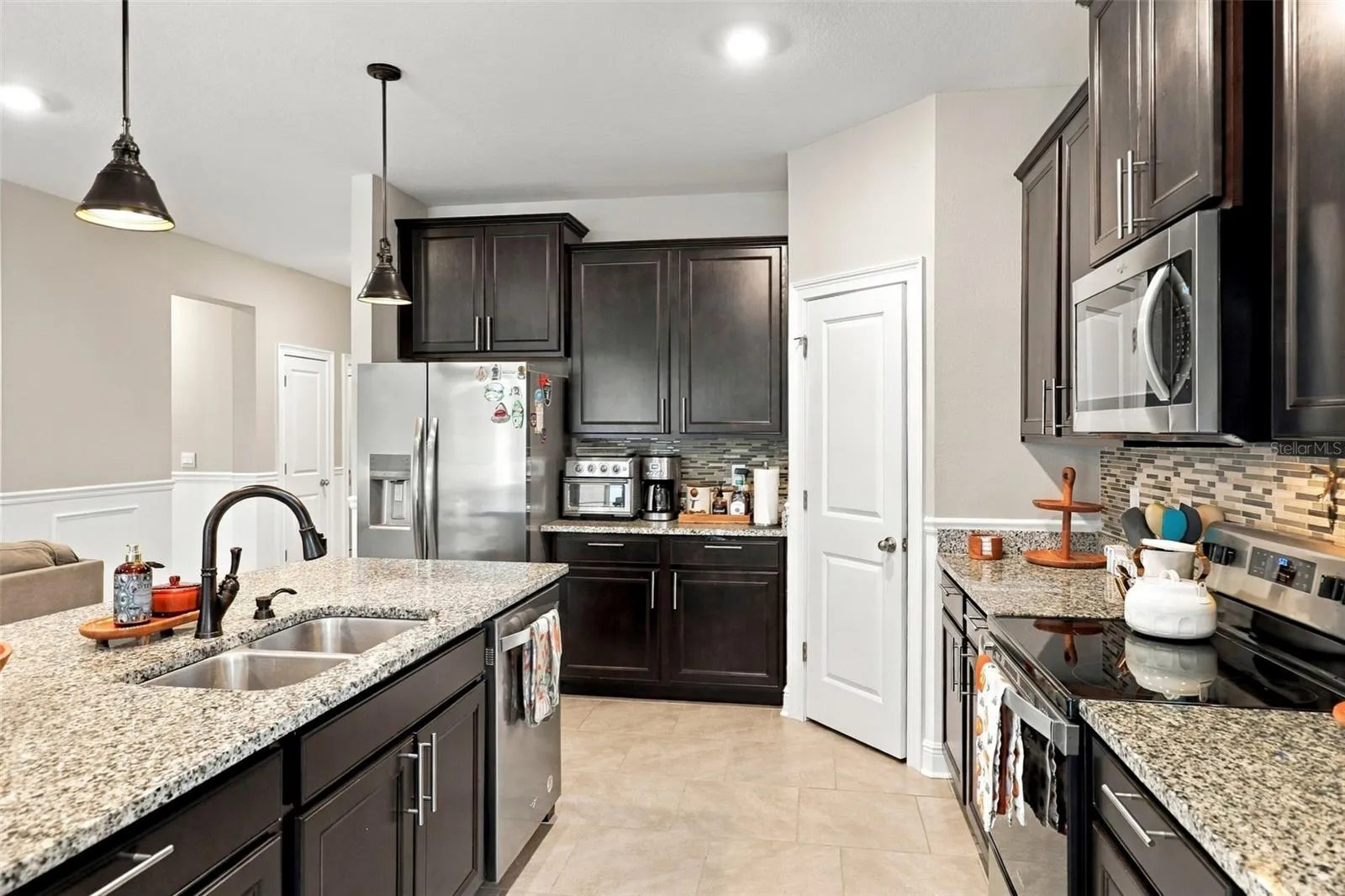 Spacious Kitchen with Ample Cabinetry and Counter Space