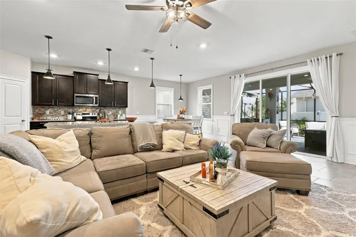Living Area Flowing Seamlessly into Kitchen and Dining Spaces