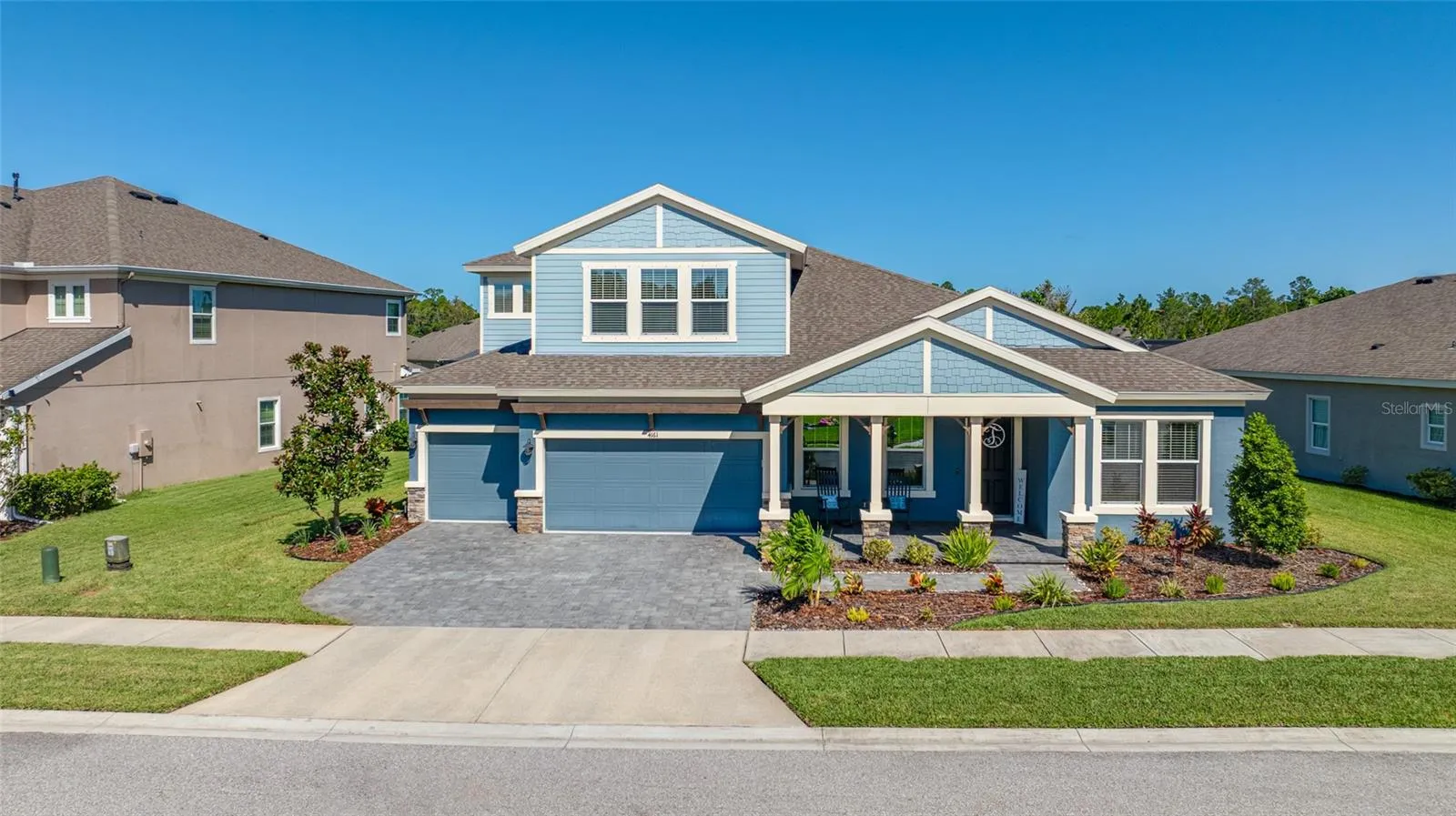 Gated Woodlands with 3 car garage
