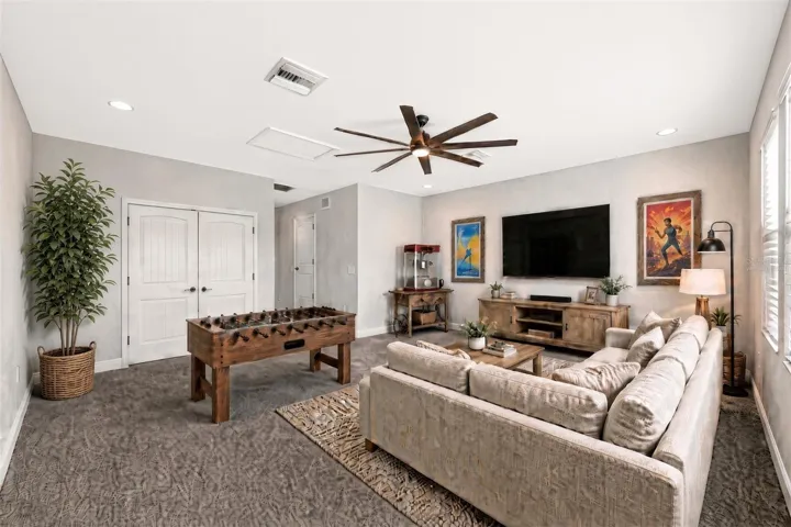 Virtually Staged Upstairs Bonus Room Suite with full bath and 5th bedroom