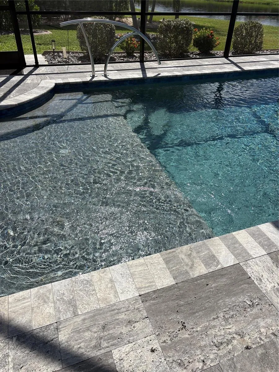 Pool's sun shelf is the perfect place to lounge