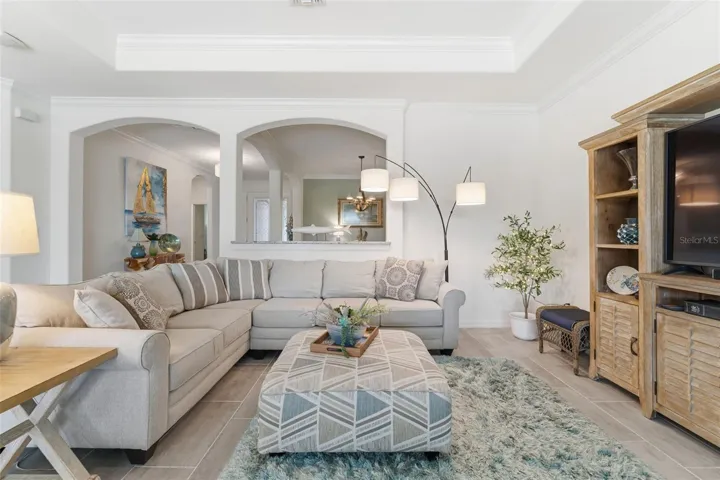 Notice the crown molding on the ceiling and within the tray ceiling