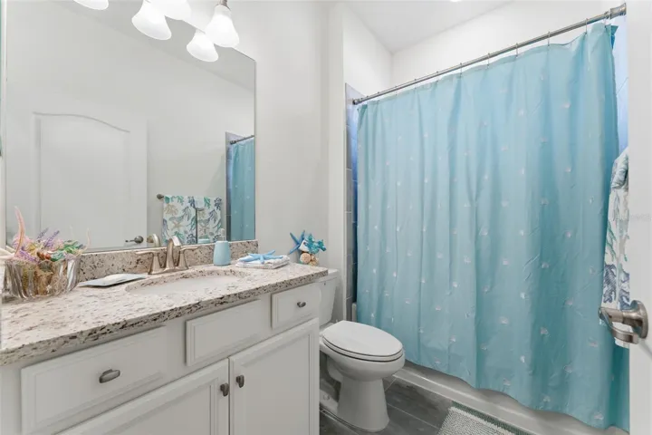 Good size Guest bath with combination tub and shower