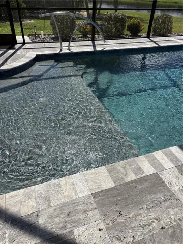 Pool's sun shelf is the perfect place to lounge