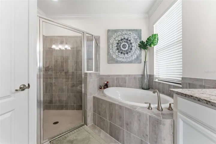 Separate shower stall with private water closet on left