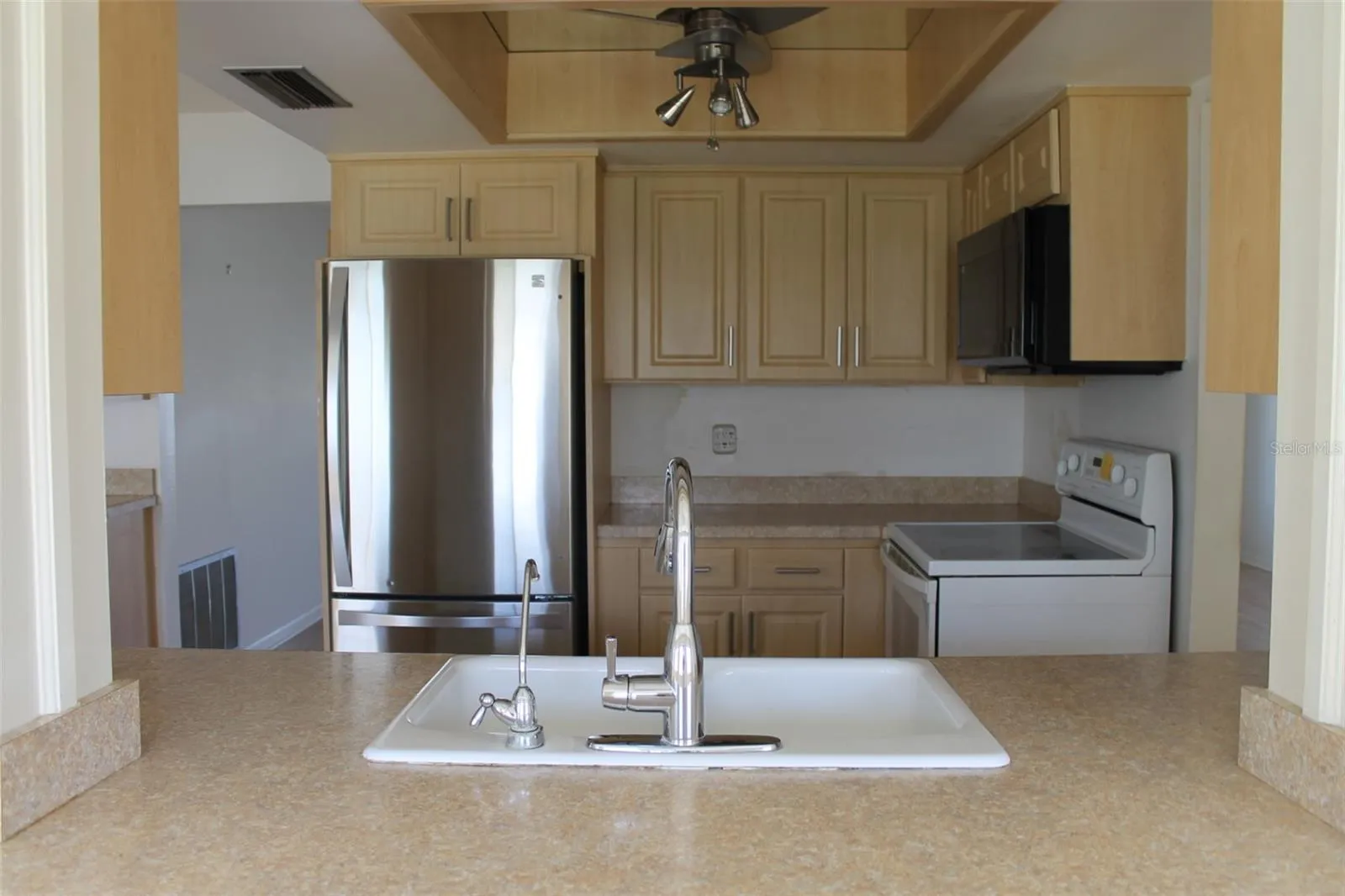 Kitchen Pass Thru View from Florida Rm