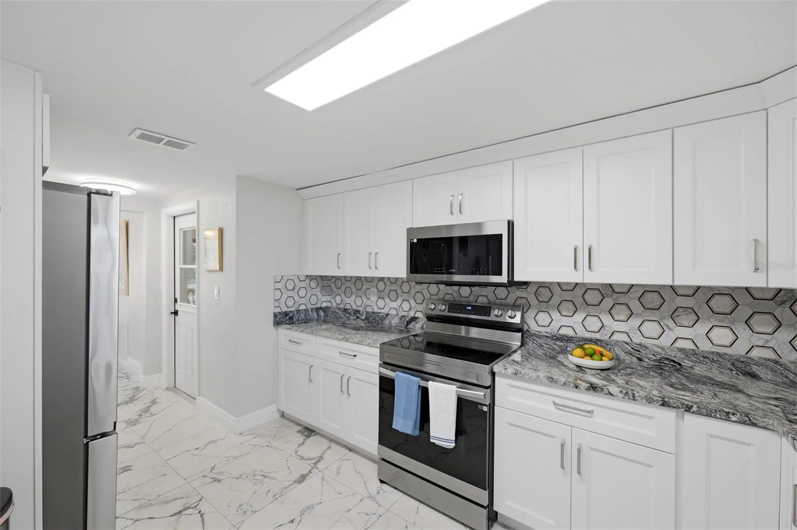 Abundant counter space.  Designer pantry.  New Samsung appliance pkg.