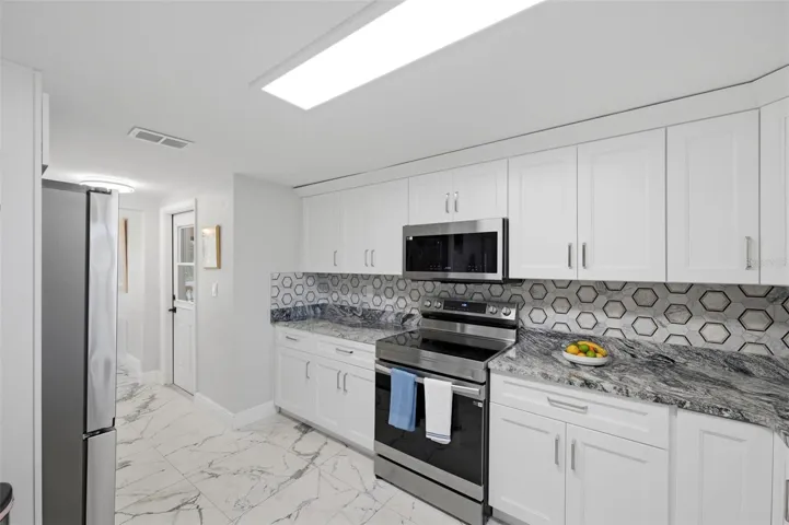 Abundant counter space.  Designer pantry.  New Samsung appliance pkg.