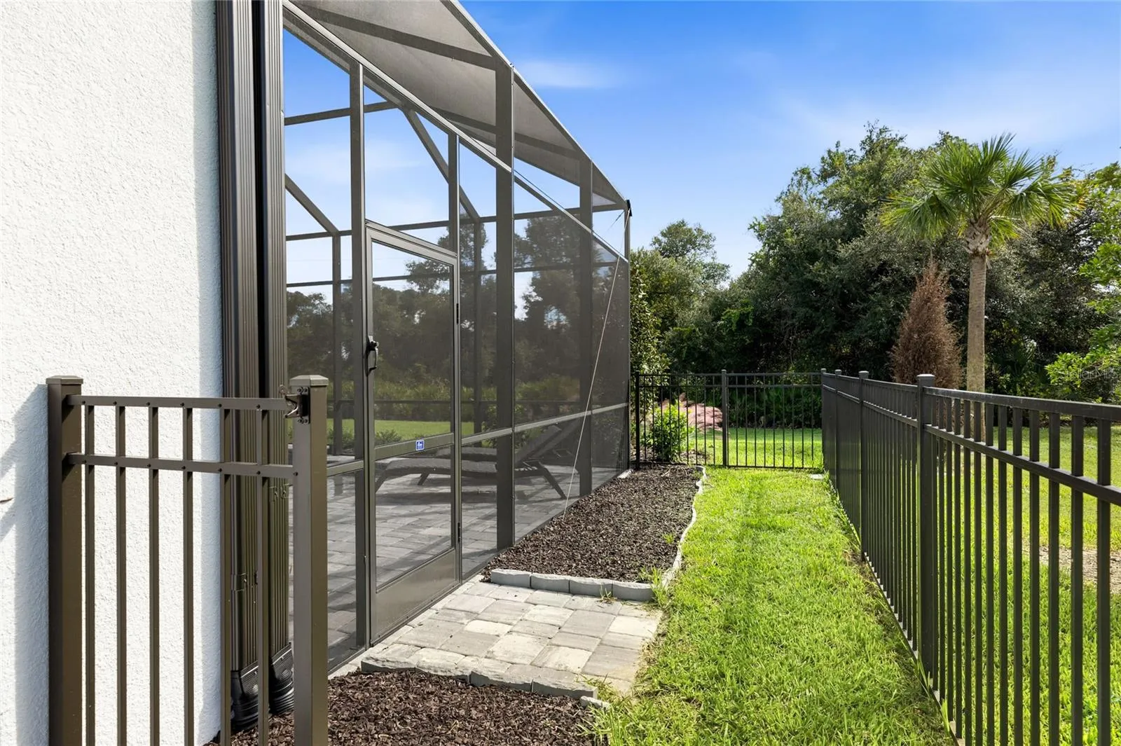 Dog run with aluminum 4 foot fencing.