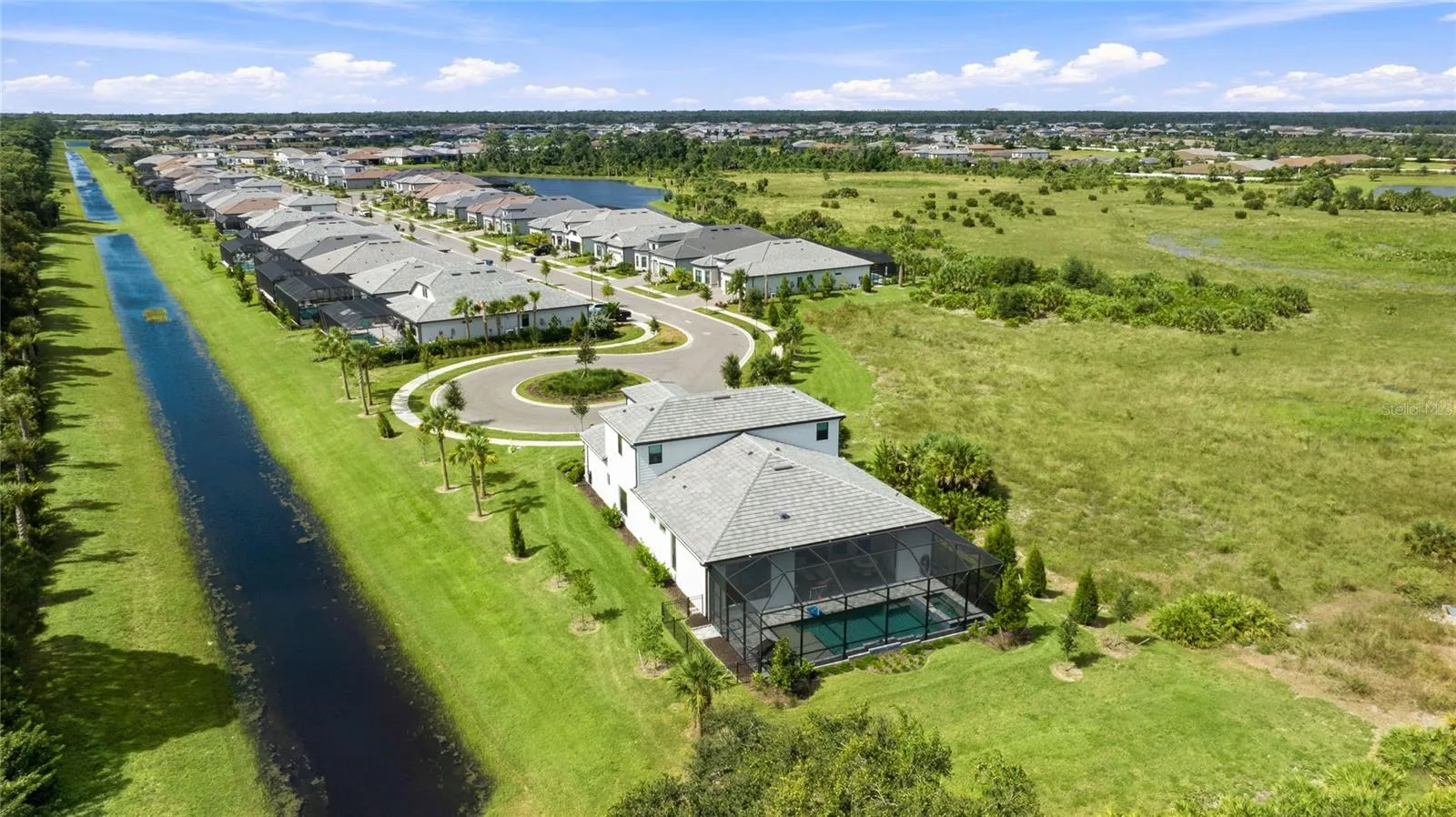 Rear Ariel view of the homehighlighting it sole residence on this cul-de-sac with preserve view and side water view.