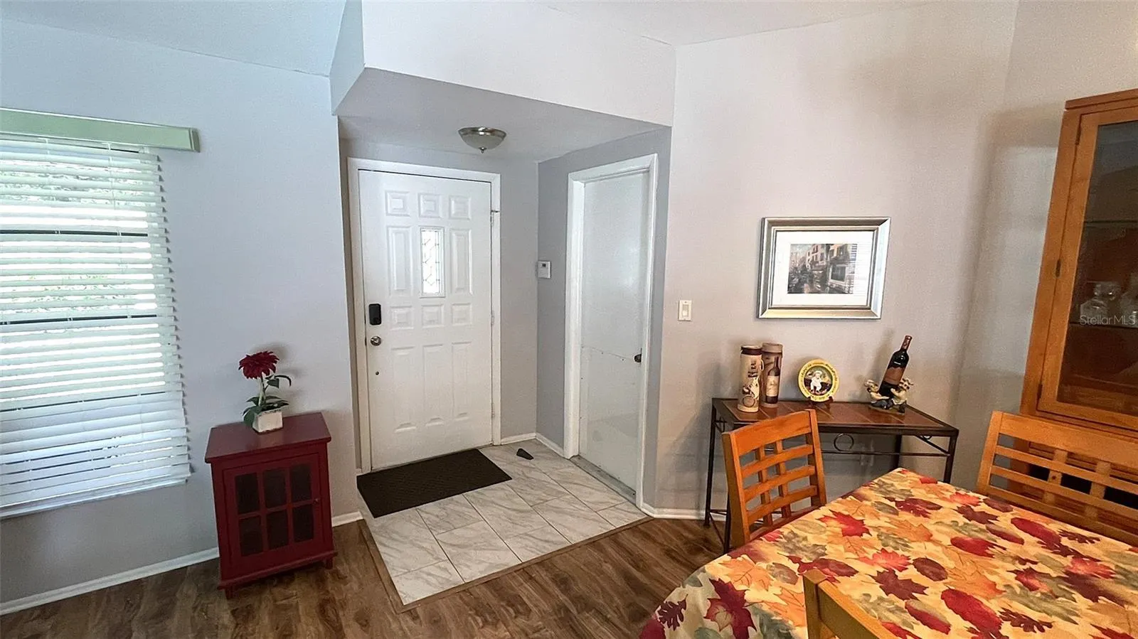Front Entry and Door to Garage.