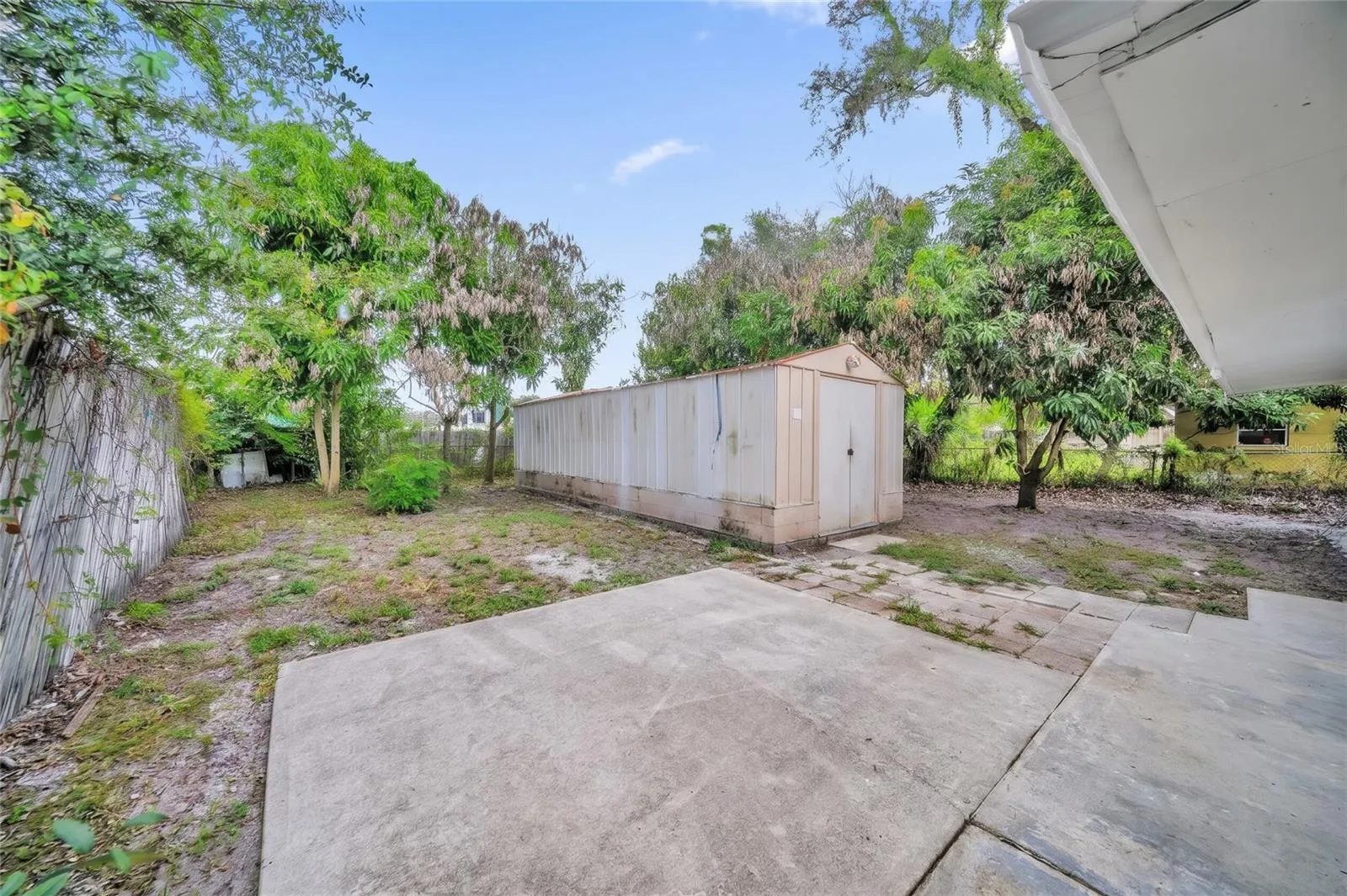 Expansive Backyard with Huge Storage