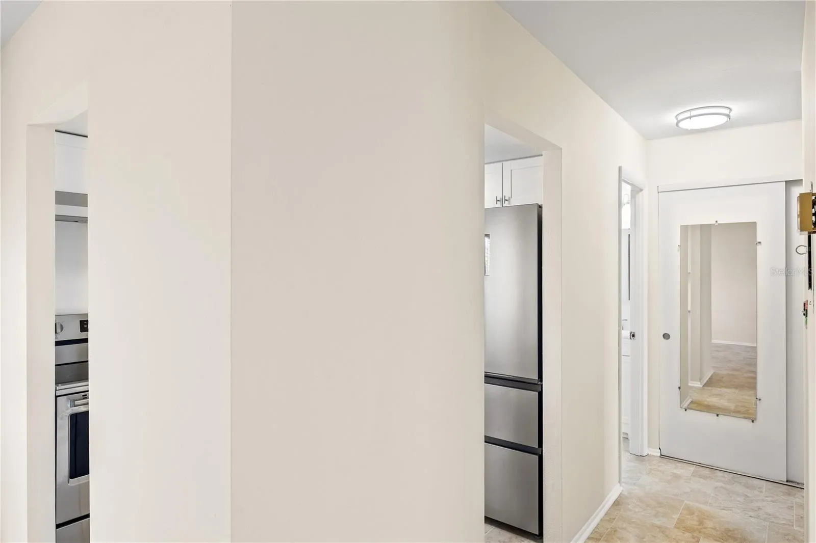 Hallway to bedroom and bathroom