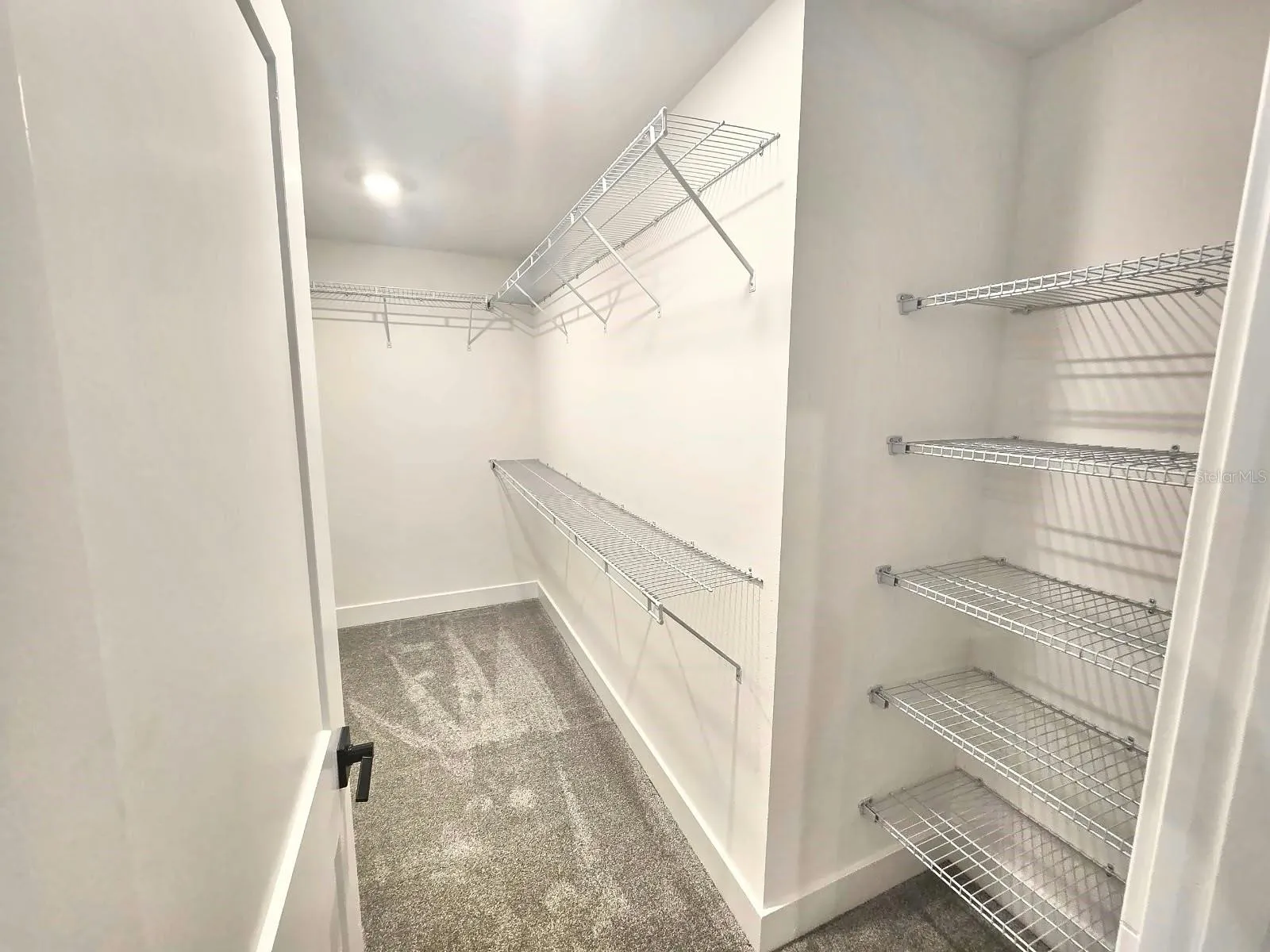 Primary walk-in closet