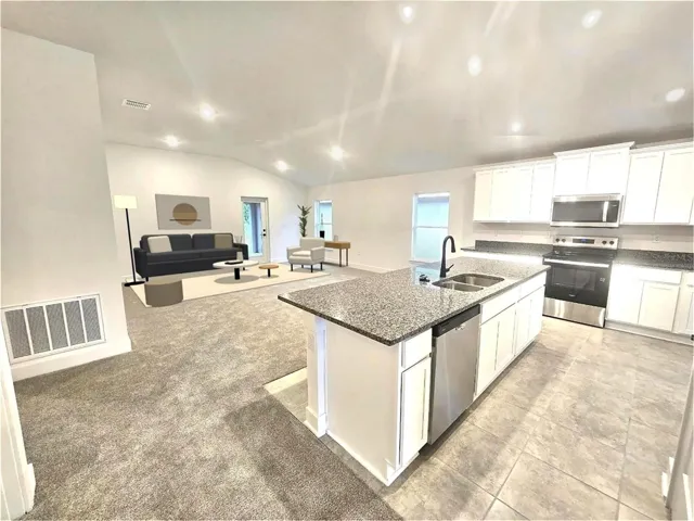 Kitchen and living room - virtually staged