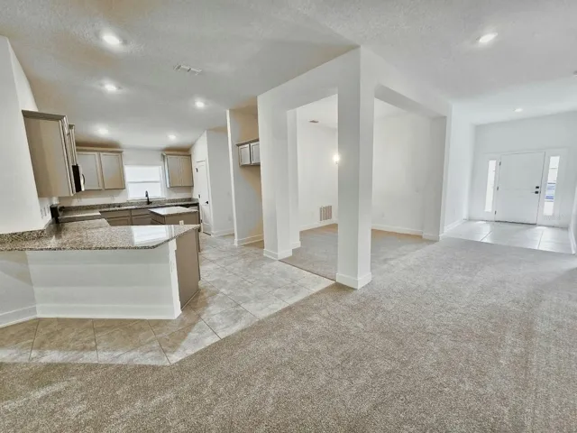 Kitchen, dining and foyer