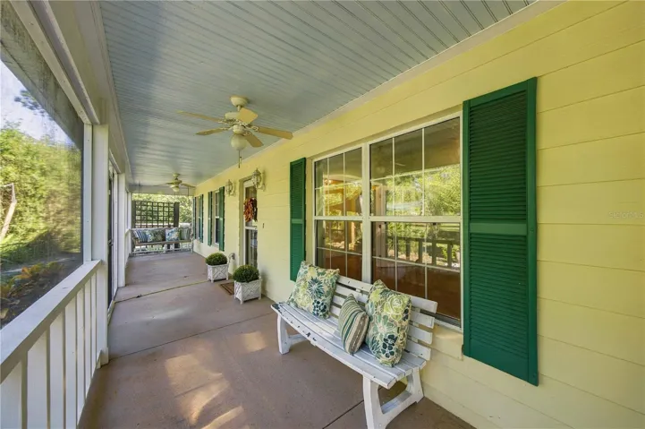 Screened porch on front of house