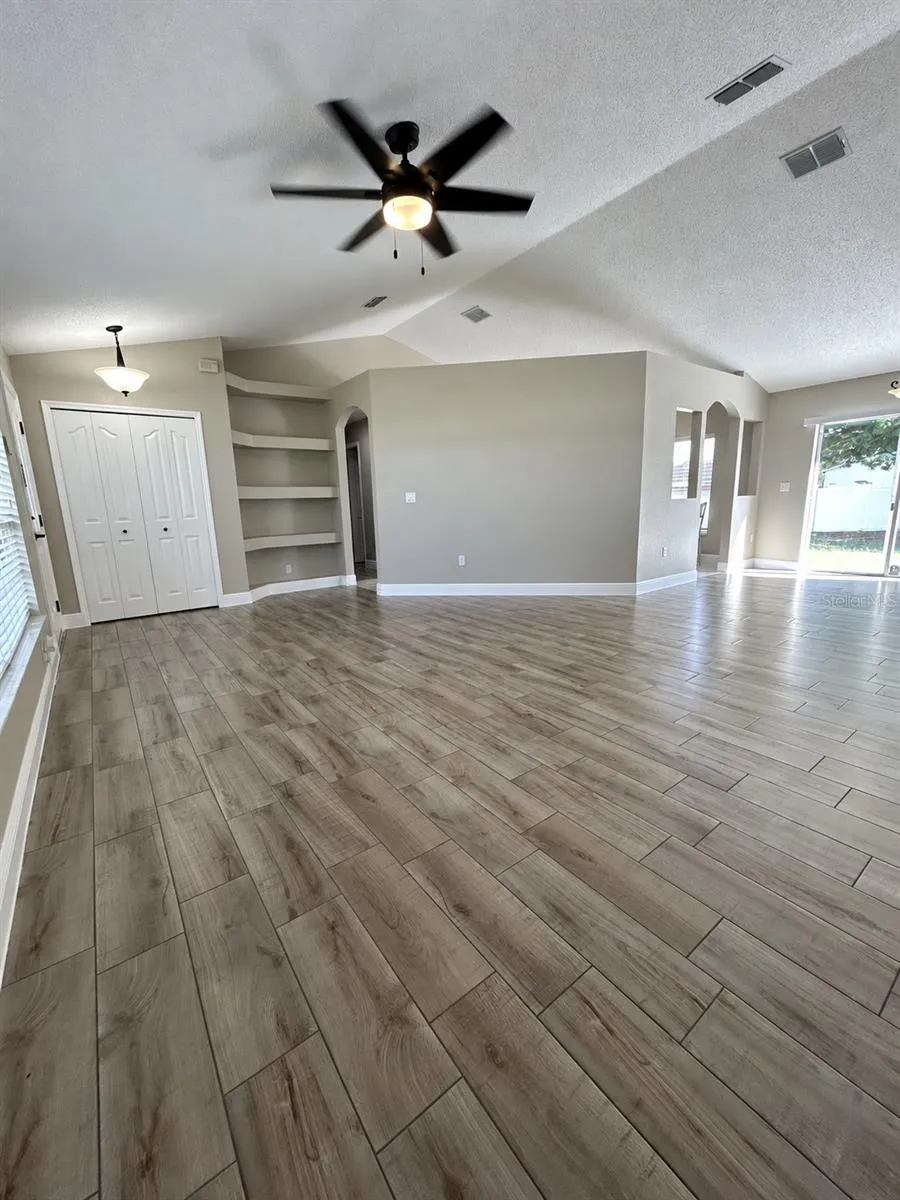 Living area with built-in shelves