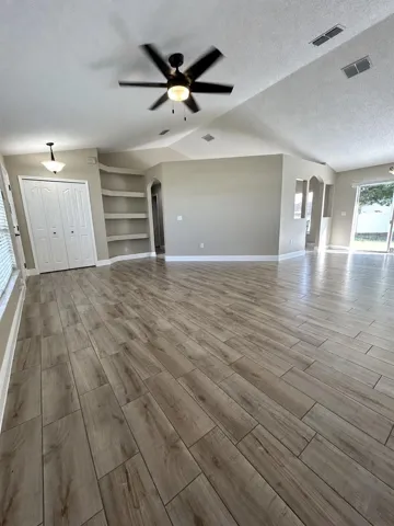 Living area with built-in shelves