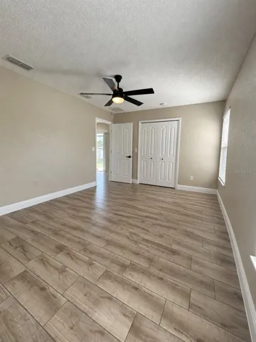 Primary bedroom and walk-in closet