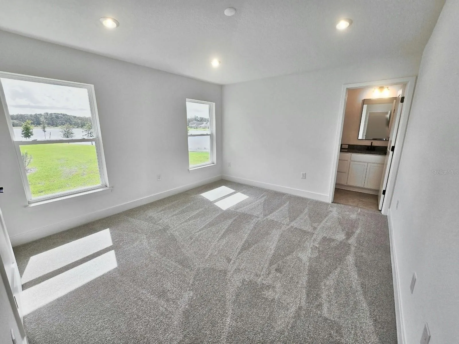 Primary bedroom with water view