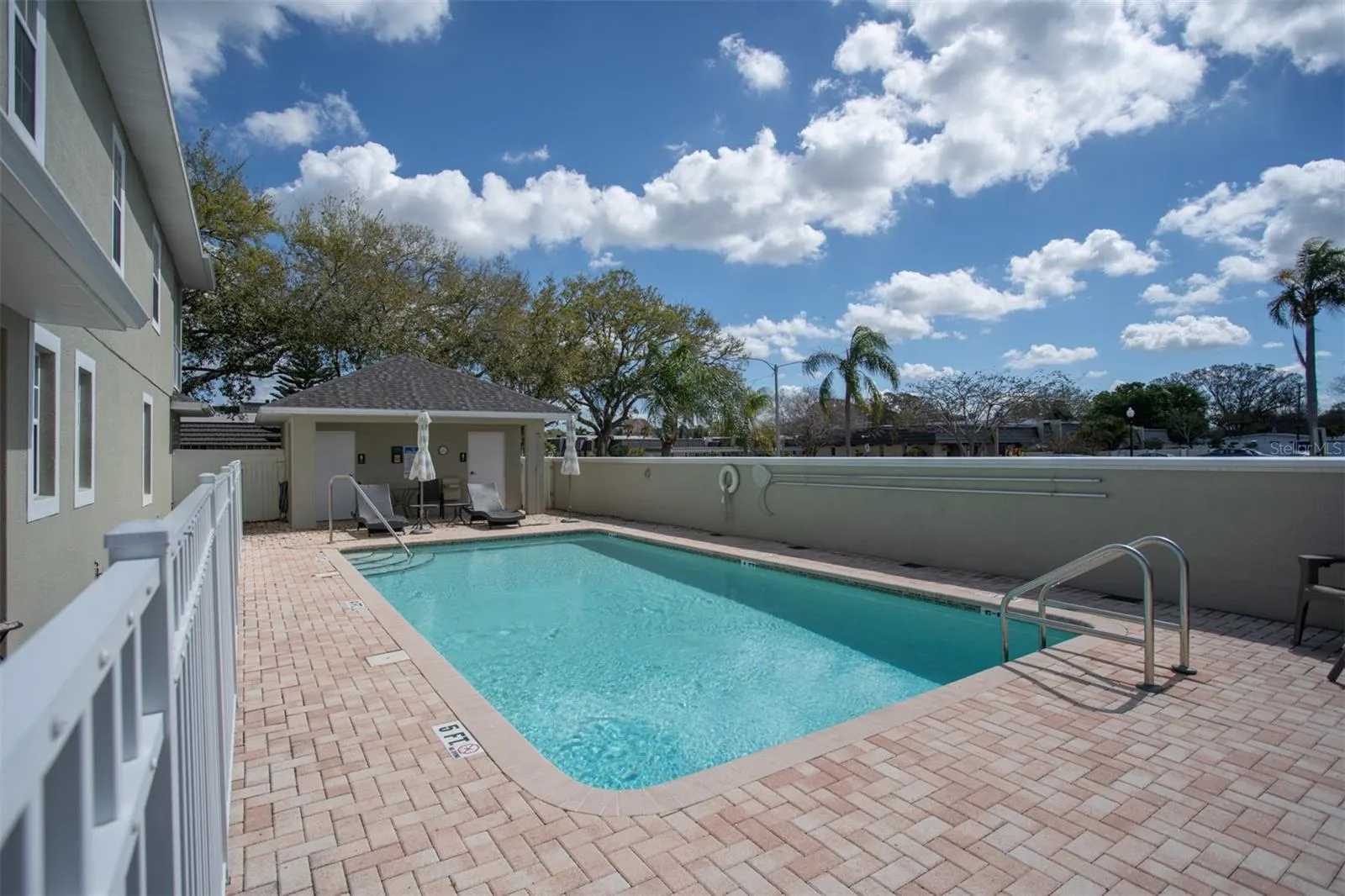 Pool is 3 Doors Away From Unit!