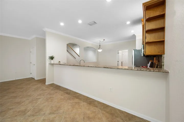Long Breakfast Bar From Kitchen to Dining Rm!