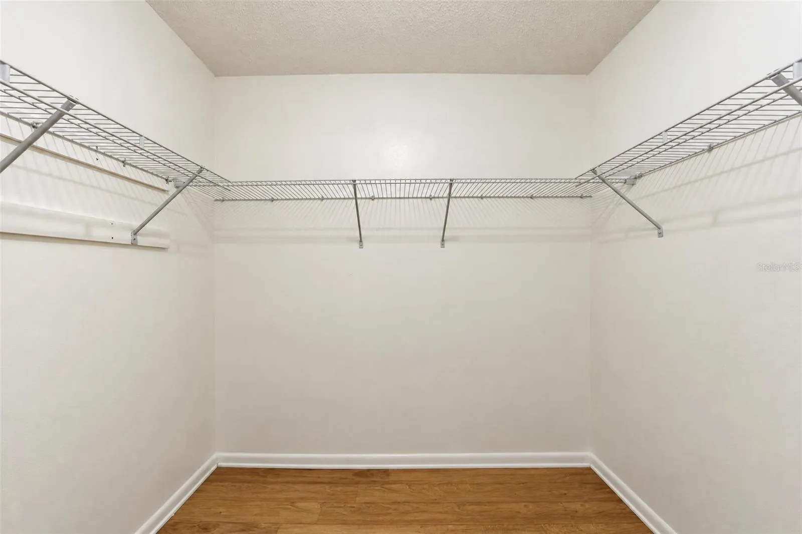 Primary walk-in closet