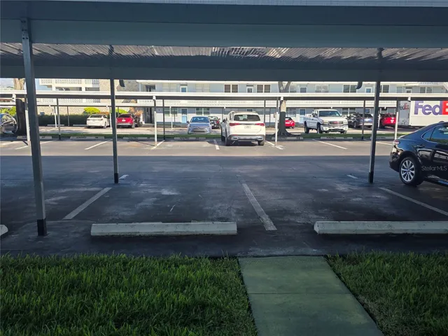 carport is directly in front of condo, just a few steps