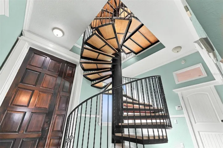 8' Wood front door Foyer with huge sturdy staircase
