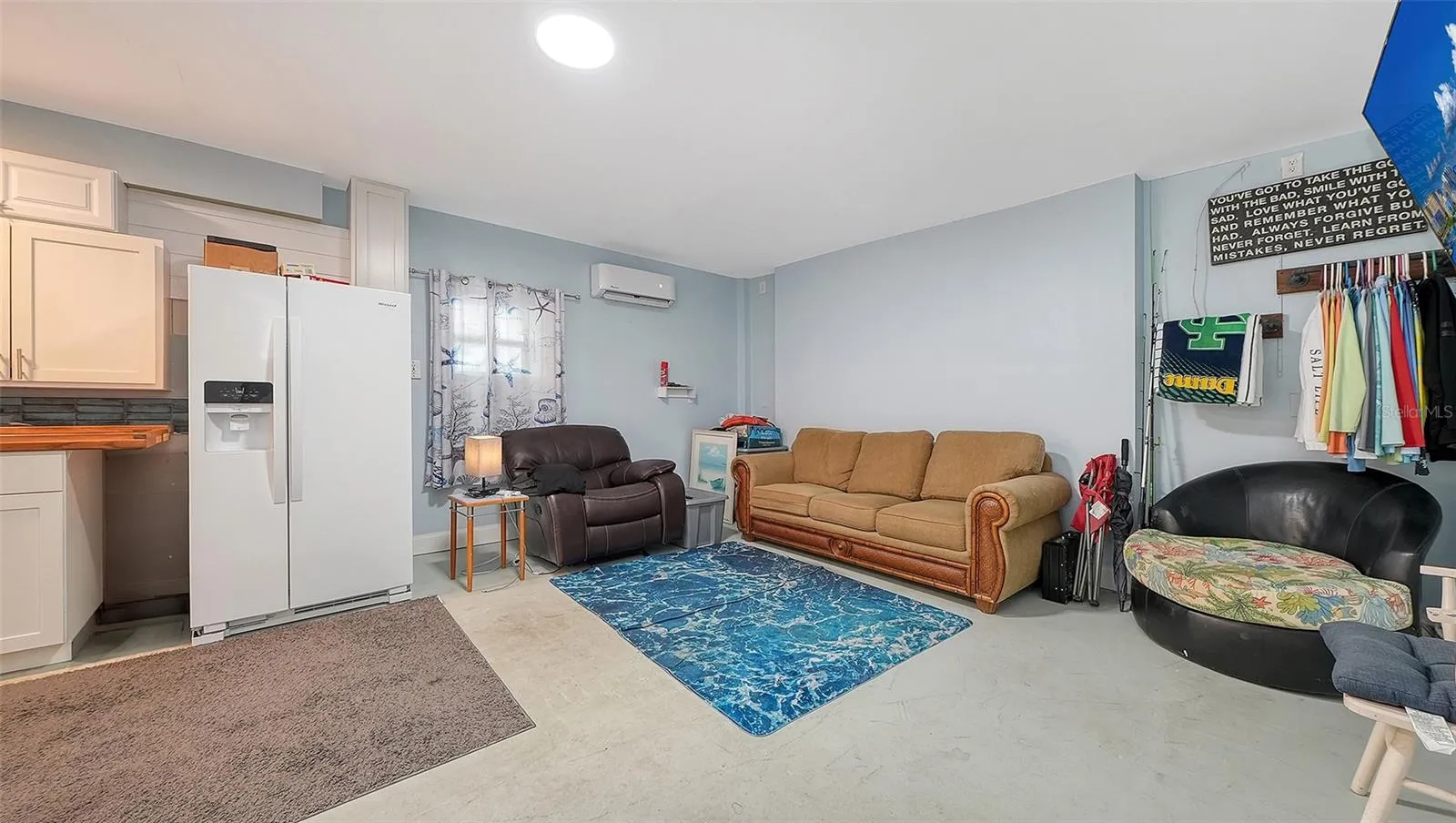 Ground floor under Unit A, efficiency apartment or in-law suite/storage space.