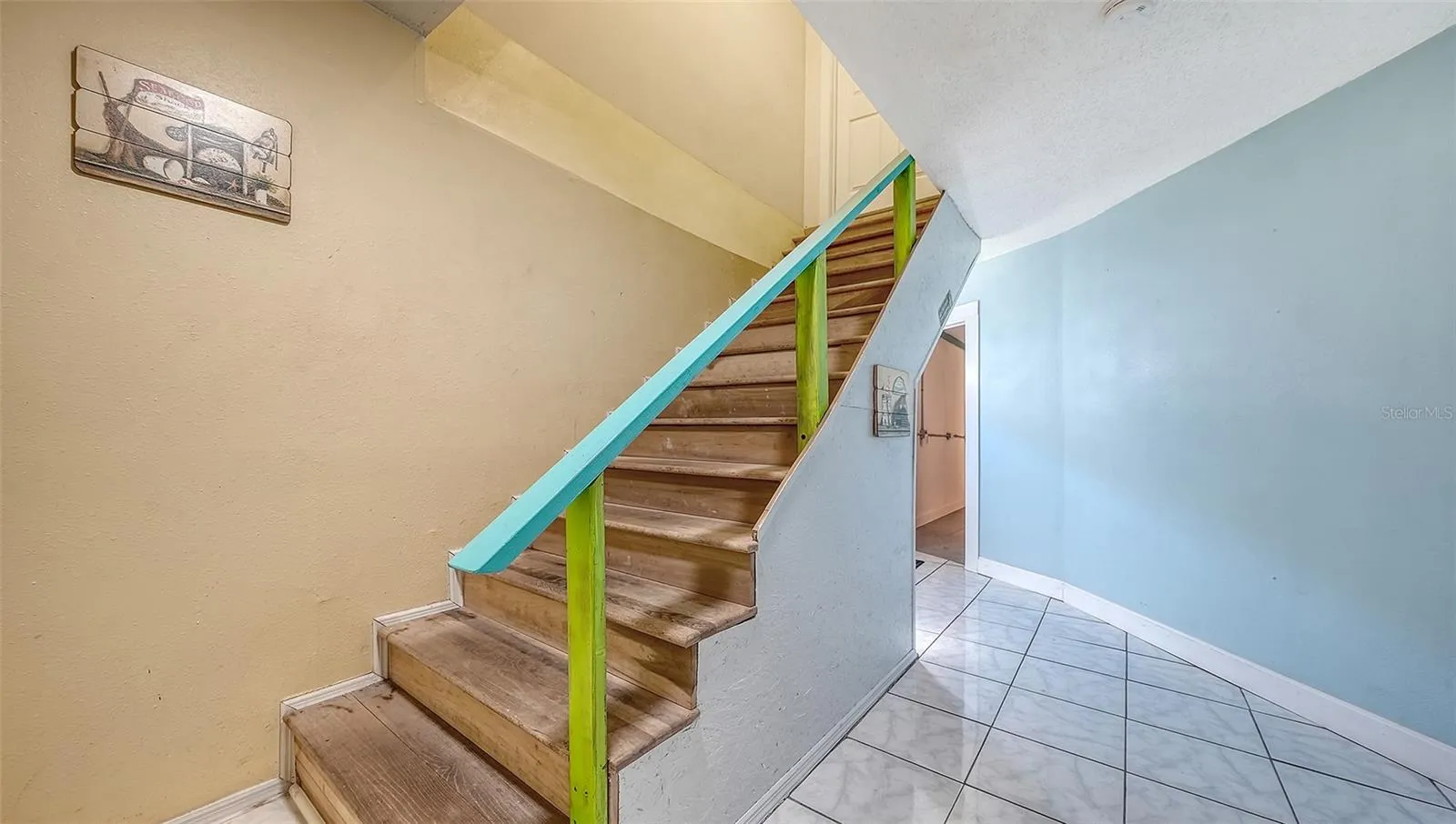 Unit B, entry hallway and stairs to Unit B.