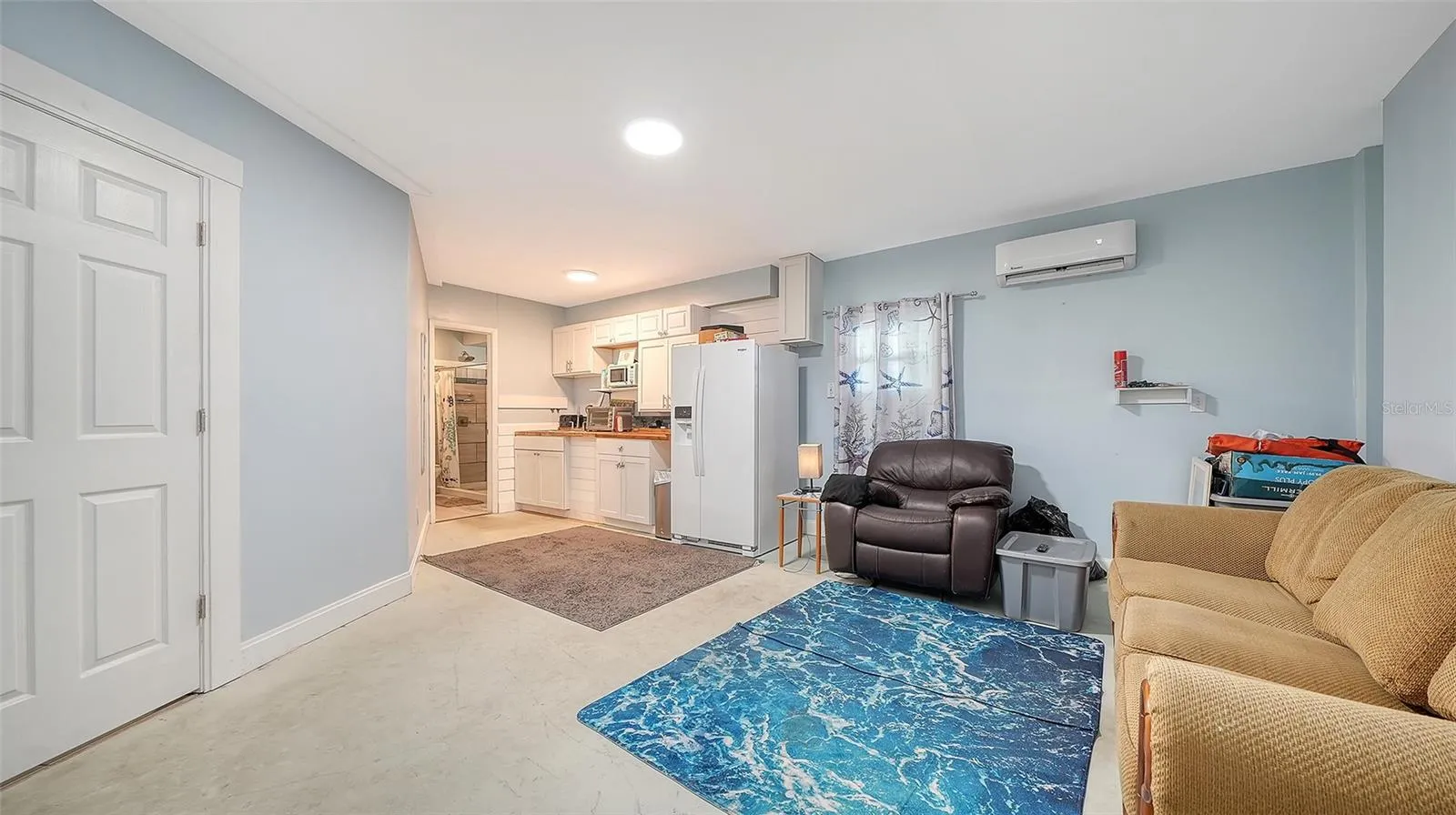 Ground floor under Unit A, efficiency apartment or in-law suite/storage space.