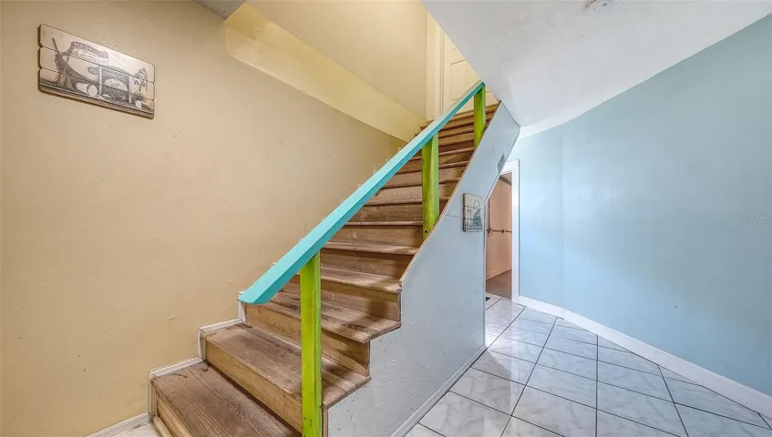Unit B, entry hallway and stairs to Unit B.