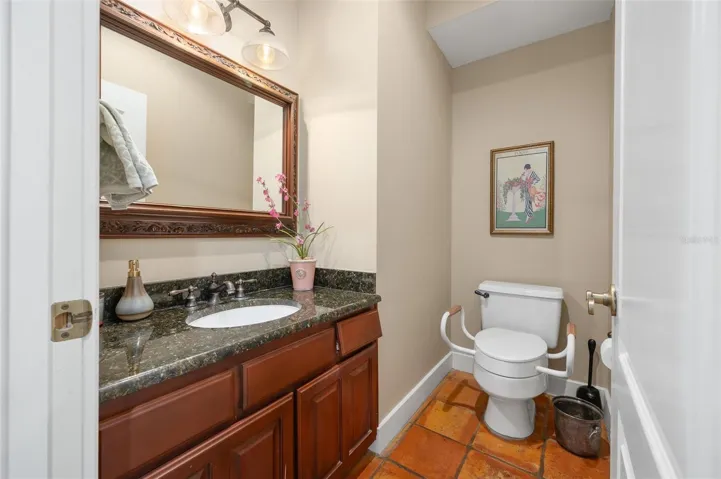 Half bath downstairs off of kitchen