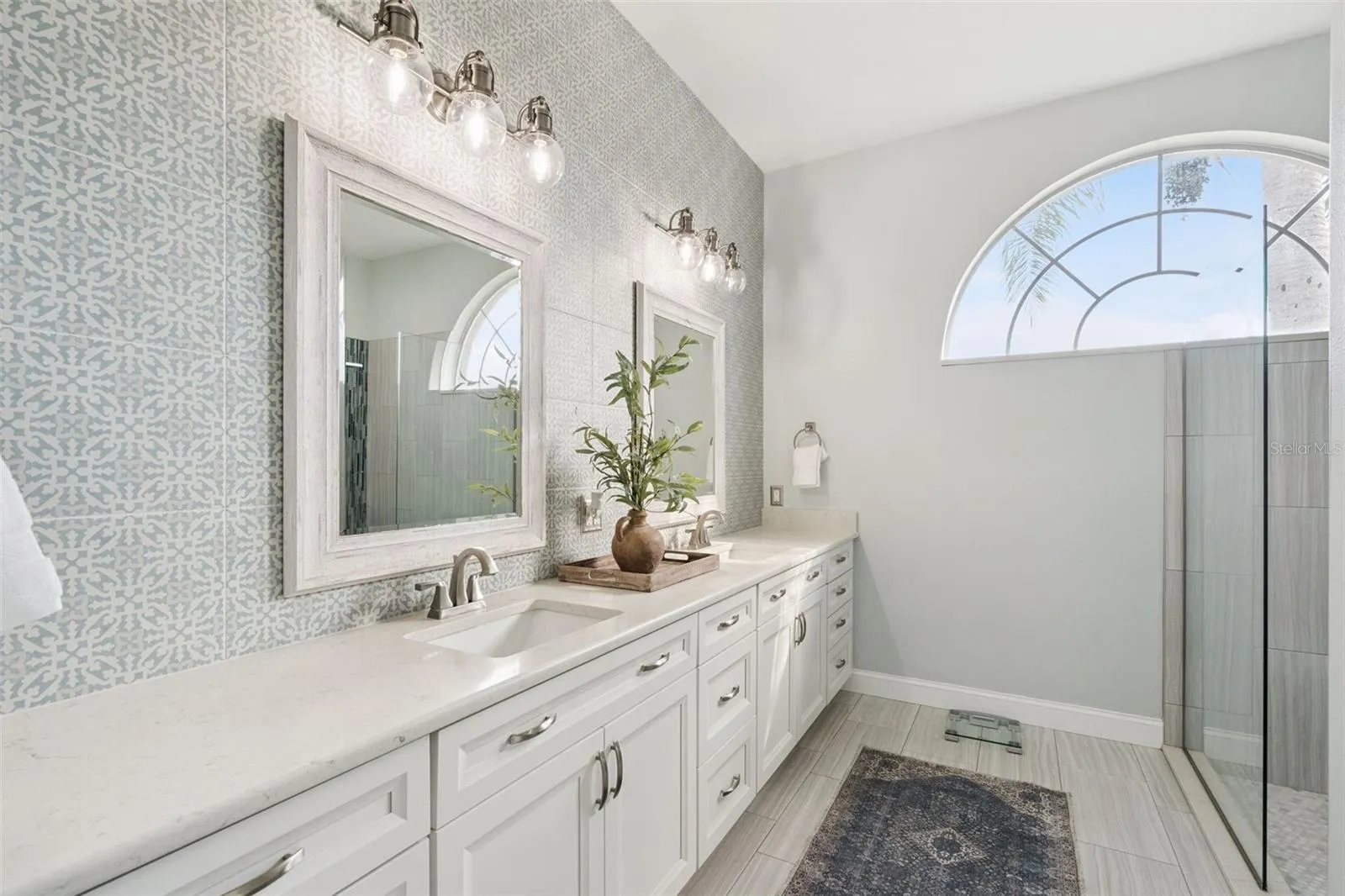 Primary Bathroom with Dual Sinks and Separate Water Closet