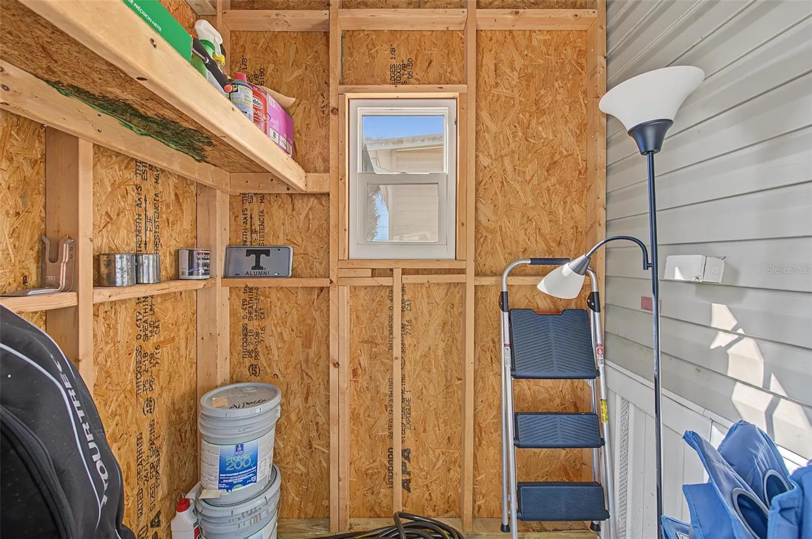 Shed is inside the screened in back porch