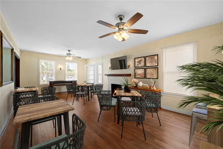 Living room (virtually staged as a cafe)