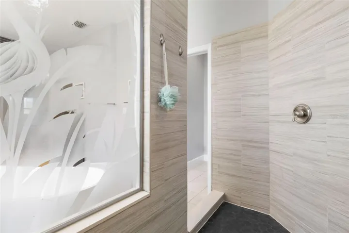 Beautifully Etched Shower Glass