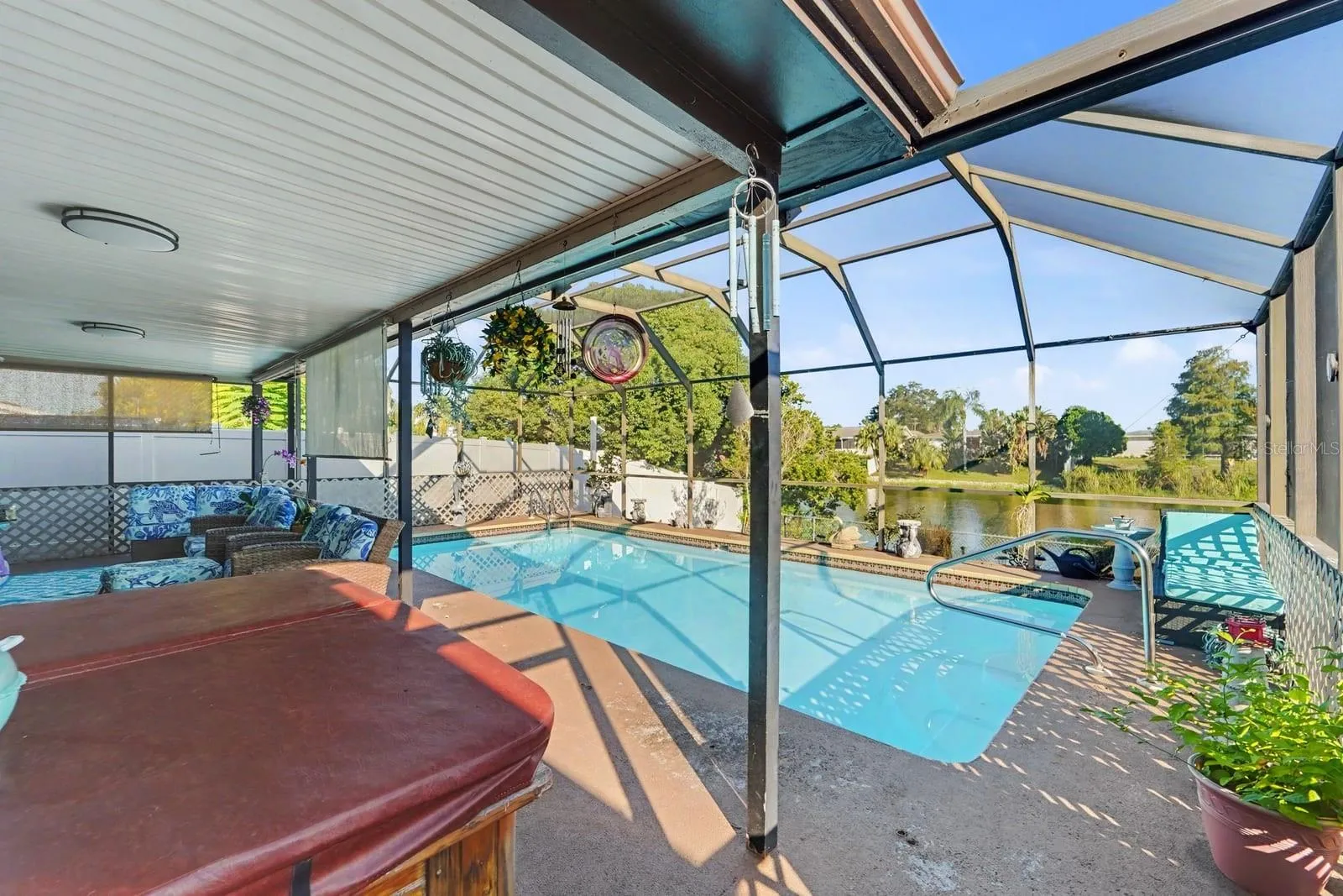 Covered Pool Deck with Retractable Shade, Hot Tub & Scenic Lakefront Views