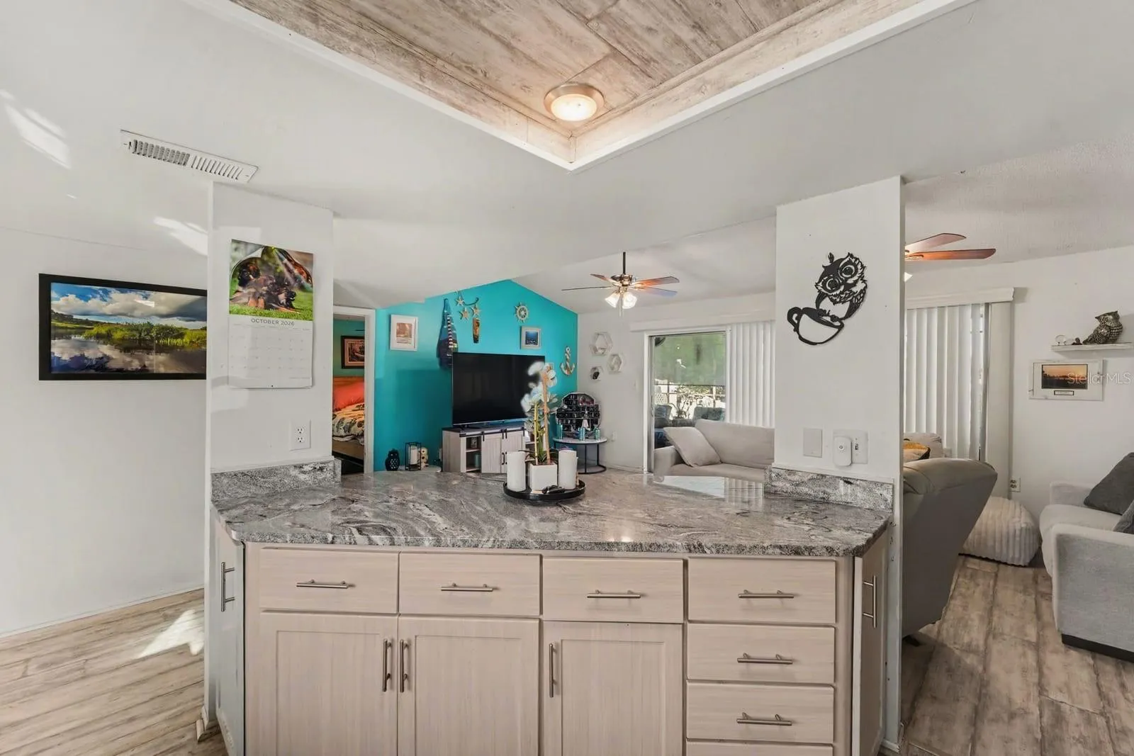 Spacious Open Floor Plan: Island Kitchen Flows Into Living Areas