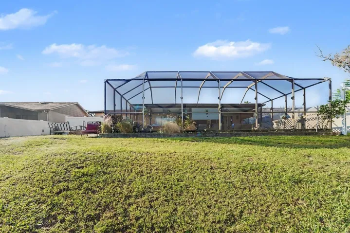 Contemporary Screened Lanai with Dual Units & Spacious Yard