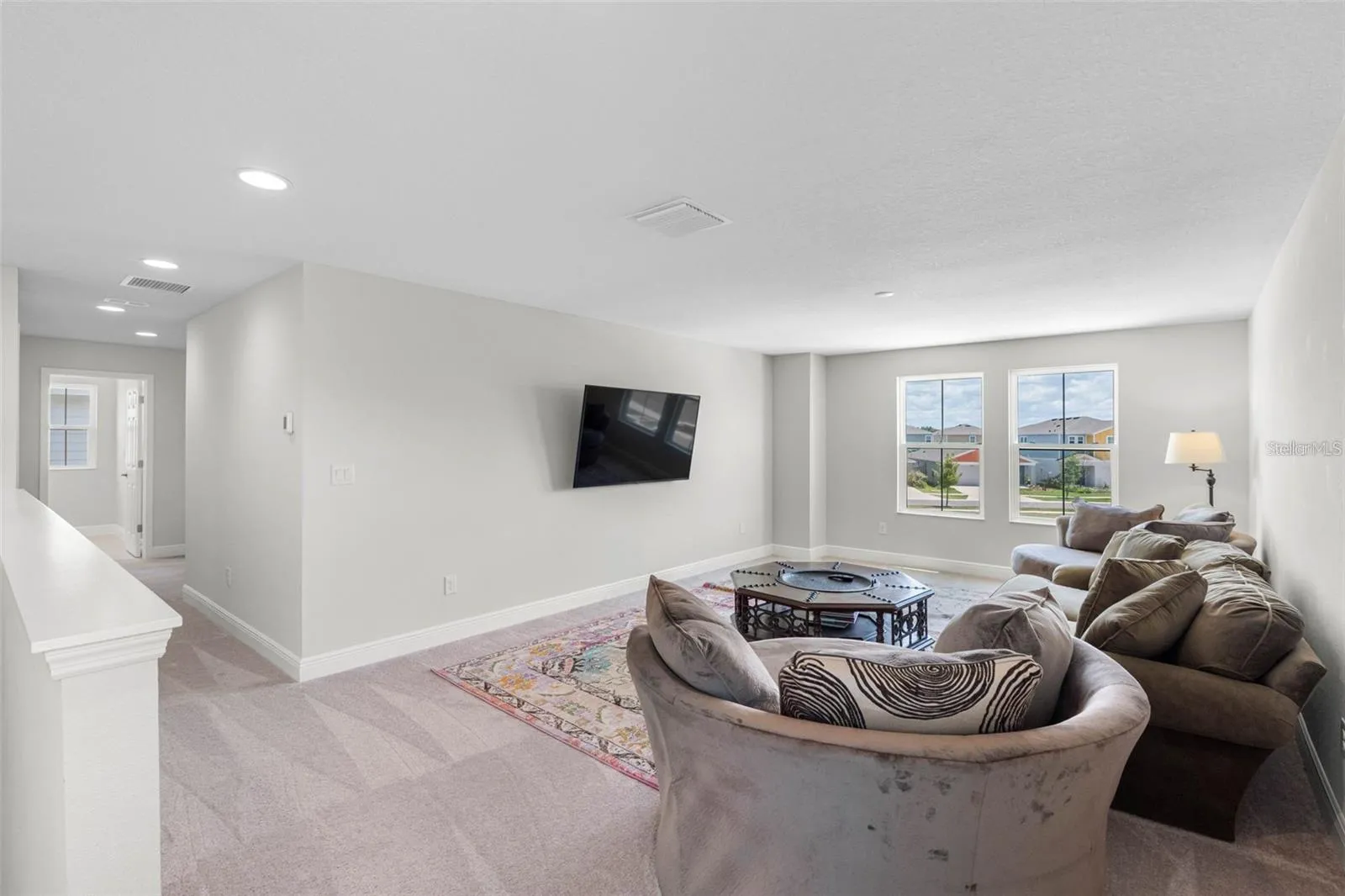 Spacious upstairs loft for a media room, playroom, or office